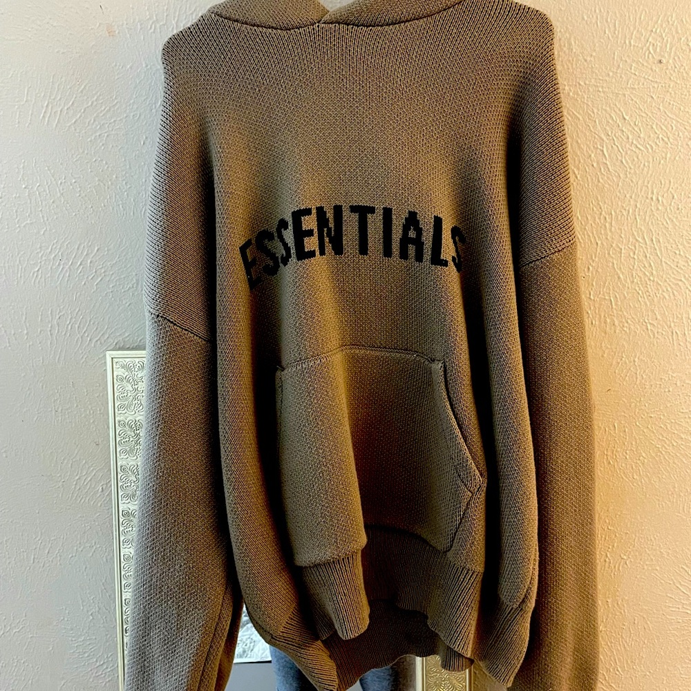 Taupe knit essential sweater.